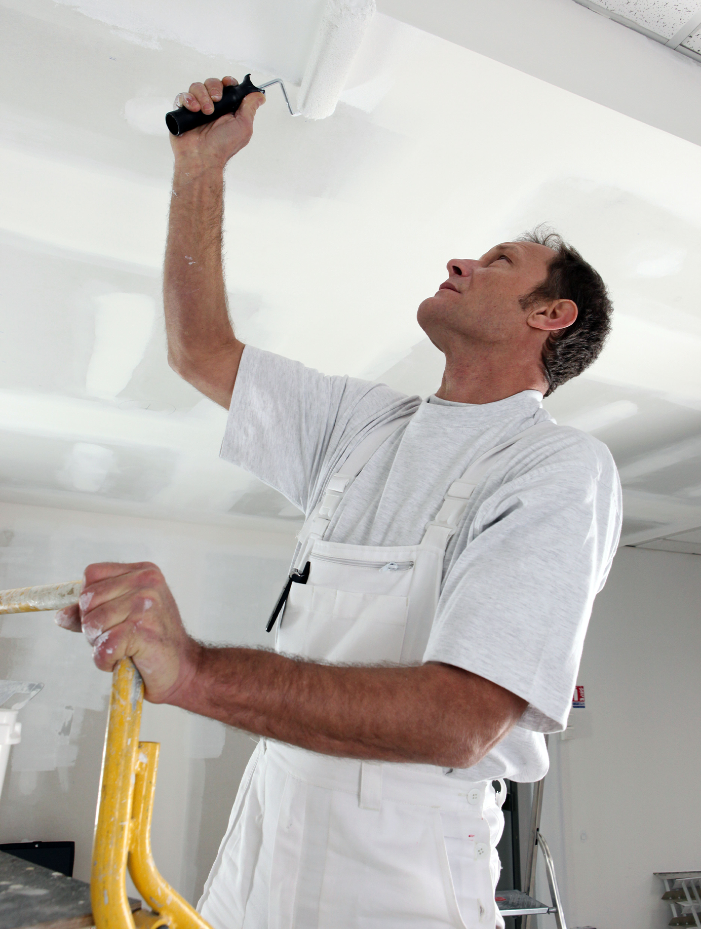 man_painting_ceiling